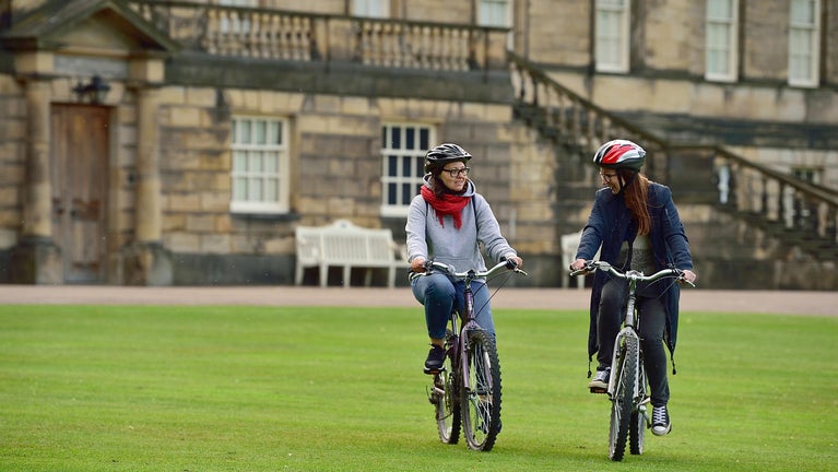 Autumn Cycling in front of the house at Nostell